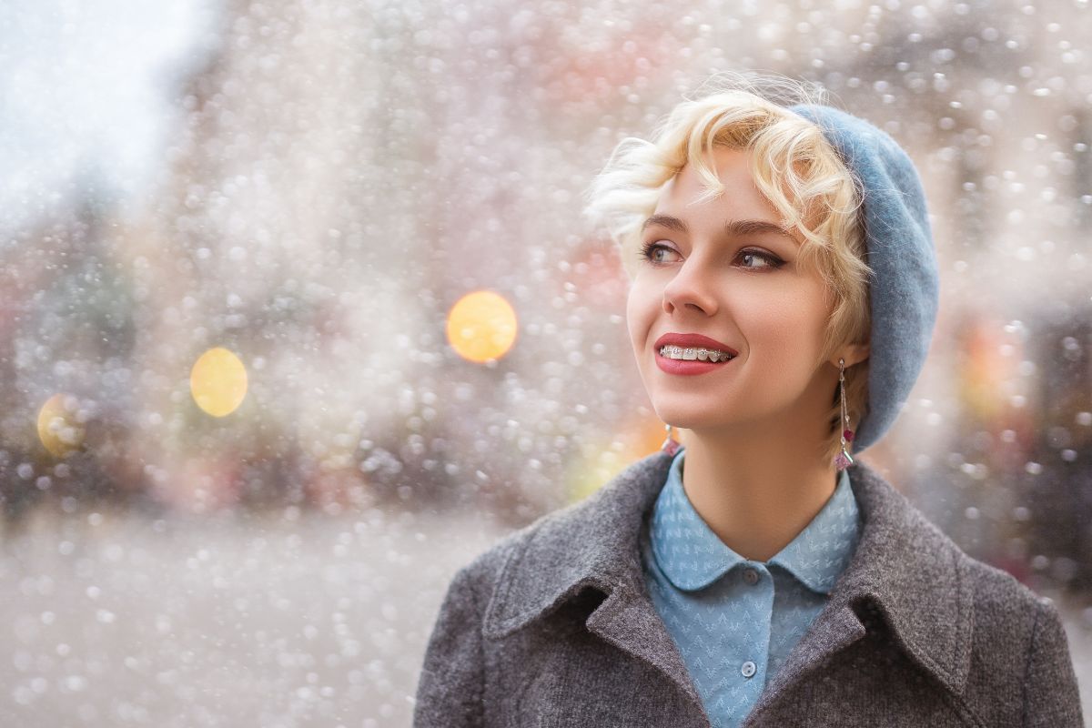 Woman smiling confidently to celebrate a new year and a new smile